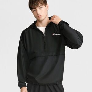 CHAMPION - Stadium Packable Jacket in Black. Wind Jacket 1/2 zip Pullover.